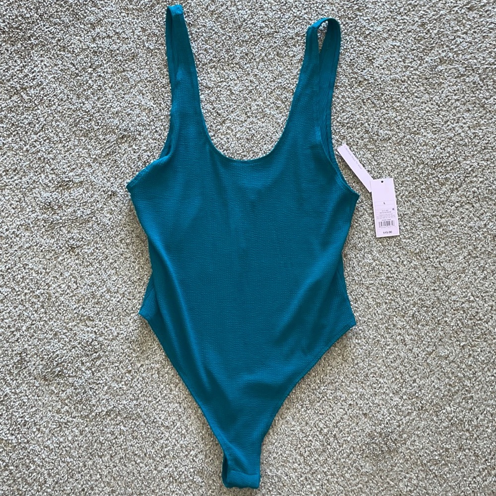 Teal body suit
